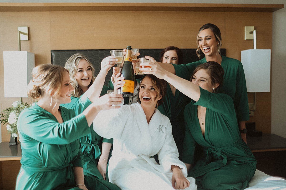 emerald-green-robes-bridesmaids.jpg