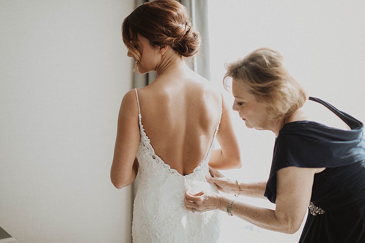 mom-helping-bride-get-ready.jpg