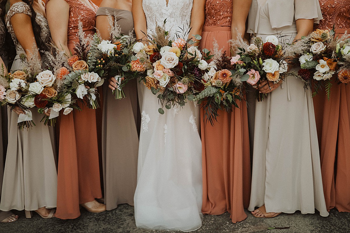 Terracotta and white flowers and dresses